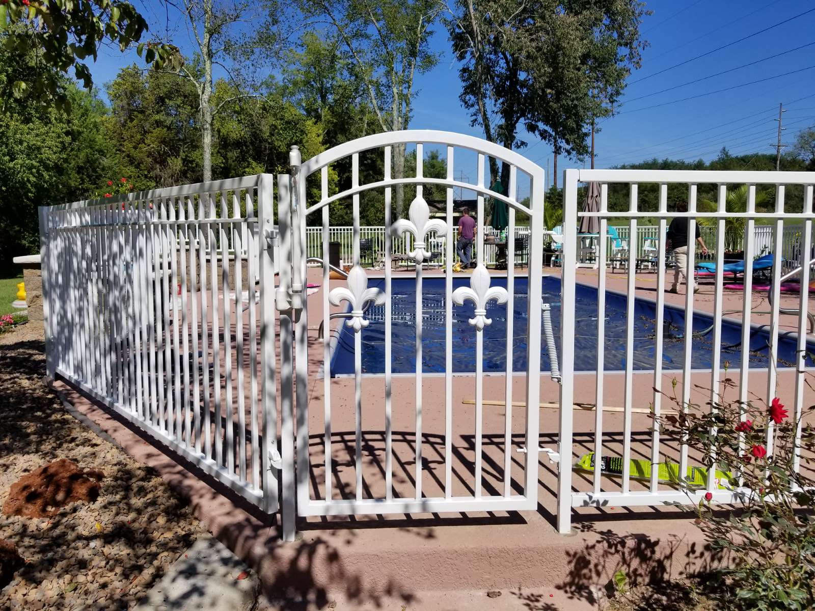 White Fence with Gate Fleur de Lis